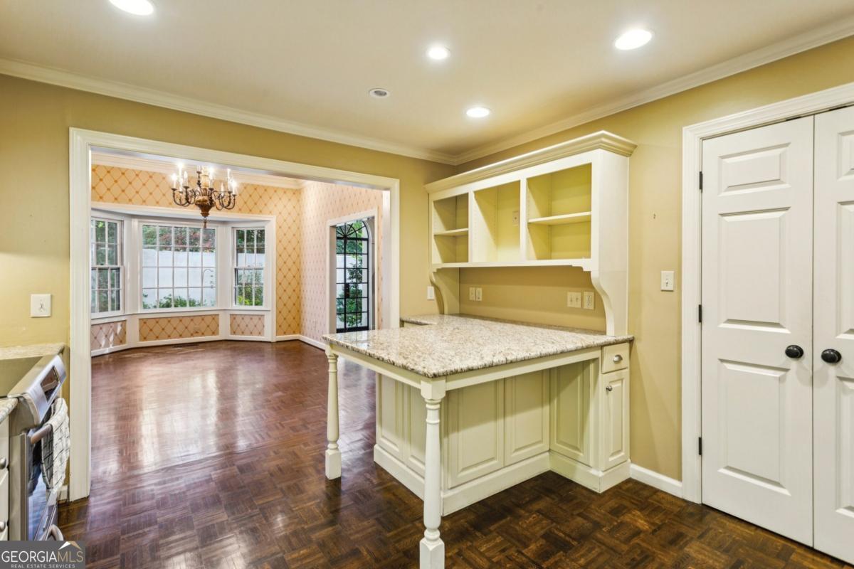 19 Mooregate Square Northwest Atlanta, GA 30327 - Photo 24 of 48 a bathroom with a granite countertop sink and shower