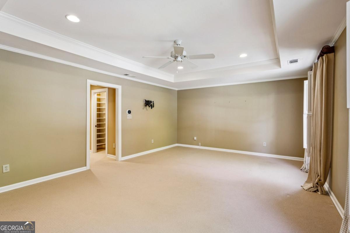 19 Mooregate Square Northwest Atlanta, GA 30327 - Photo 28 of 48 an empty room with windows and closet