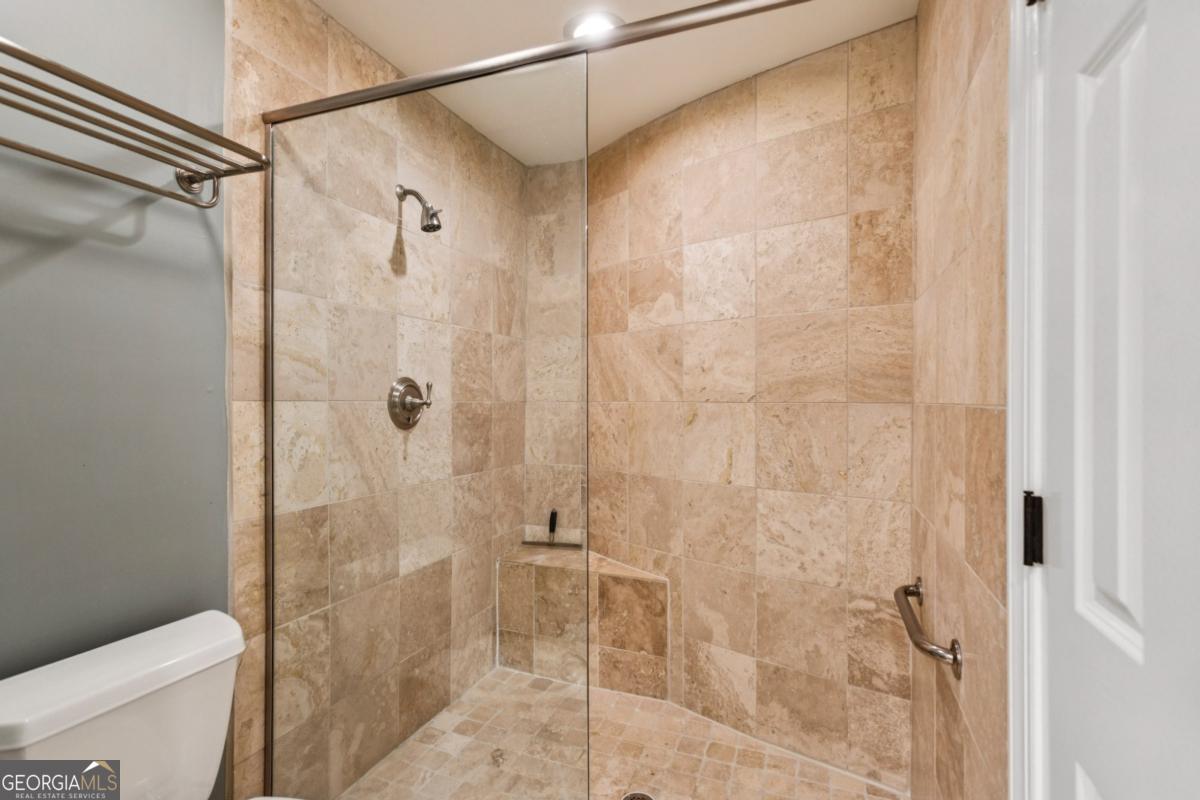 19 Mooregate Square Northwest Atlanta, GA 30327 - Photo 32 of 48 a bathroom with a shower and a toilet