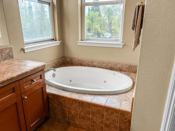 a bathroom with a sink and a bathtub