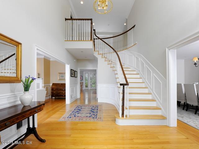 10 Tyler Lane Riverside, CT 06878 - Photo 2 of 25 a view of entryway and hall with wooden floor