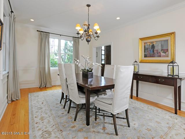 10 Tyler Lane Riverside, CT 06878 - Photo 5 of 25 a dining room with furniture and chandelier