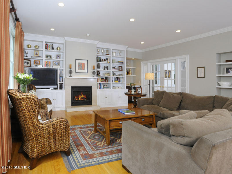 10 Tyler Lane Riverside, CT 06878 - Photo 7 of 25 a living room with furniture fireplace and a window