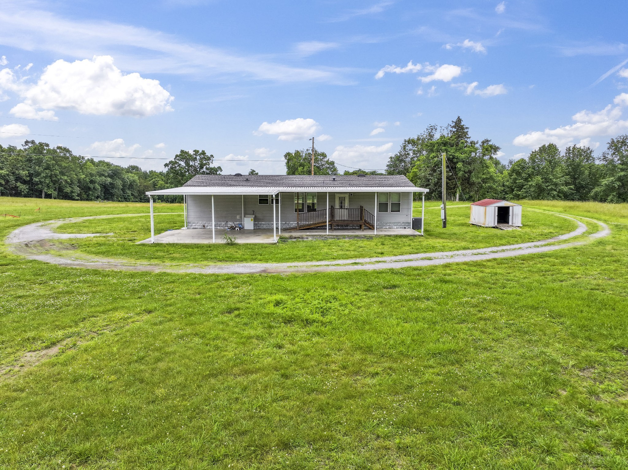 439 Philippi Road Wartrace, TN 37183 - Photo 15 of 29 a view of a house with a big yard