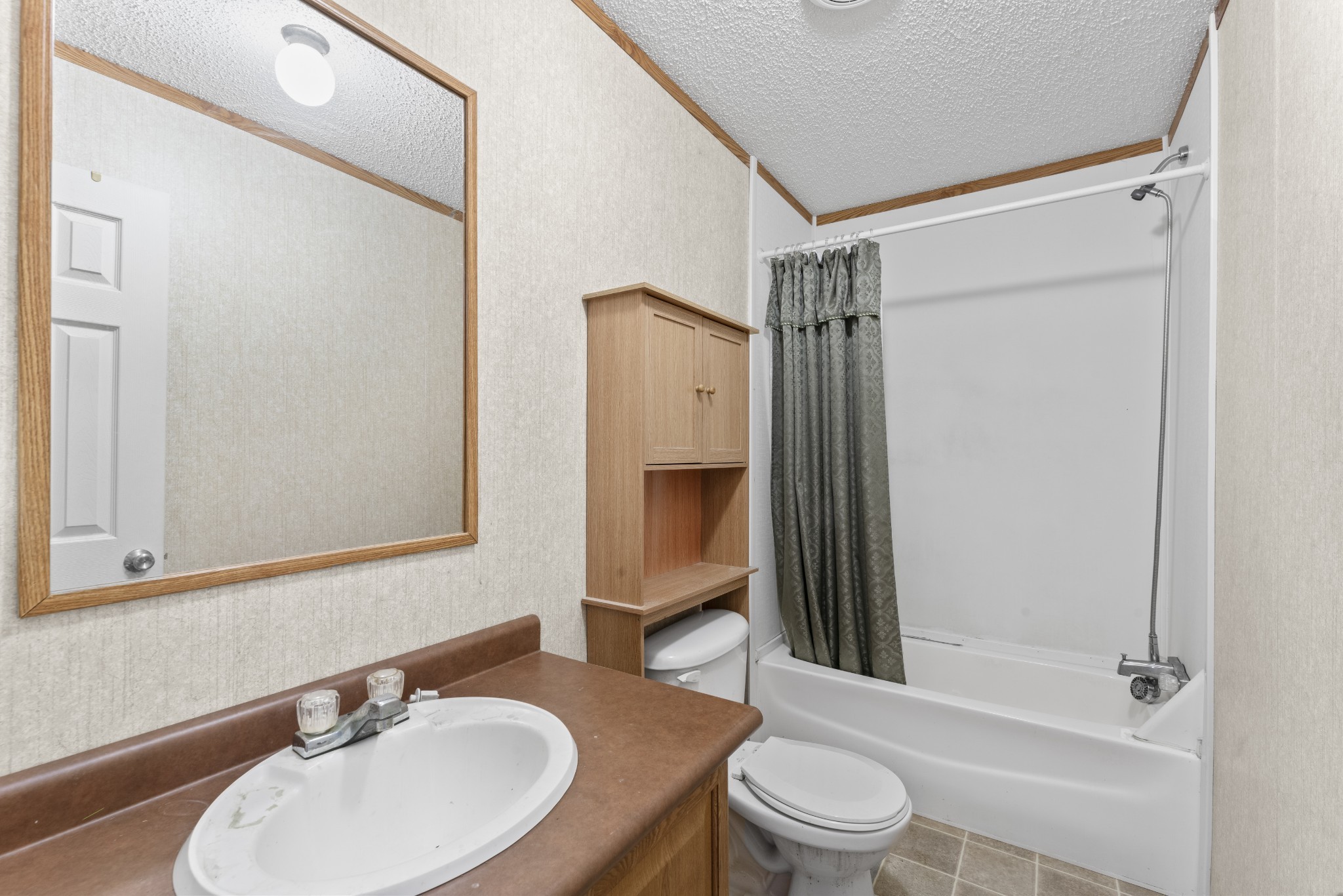 439 Philippi Road Wartrace, TN 37183 - Photo 28 of 29 a bathroom with a sink toilet and shower