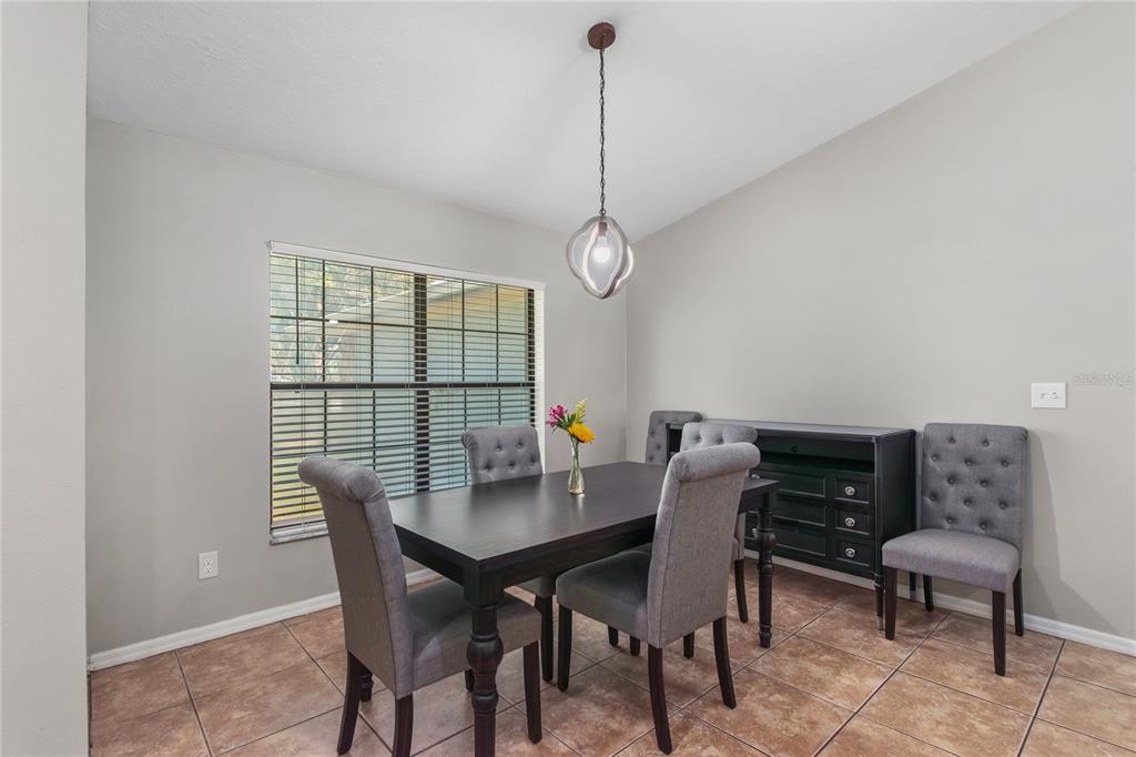 10 Carry Back Road Ocala, FL 34482 - Photo 11 of 69 a dining room with furniture and window