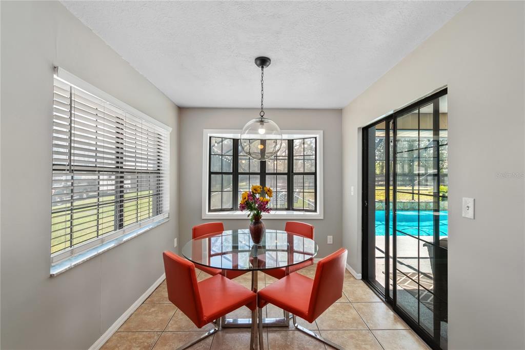 10 Carry Back Road Ocala, FL 34482 - Photo 18 of 69 a dining room with furniture window and outside view