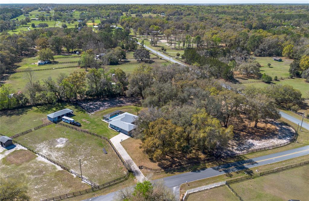 10 Carry Back Road Ocala, FL 34482 - Photo 3 of 69 an aerial view of a house with a yard basket ball court and outdoor seating