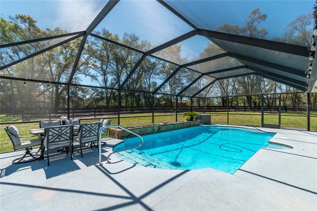 10 Carry Back Road Ocala, FL 34482 - Photo 42 of 69 a view of swimming pool with seating area and furniture