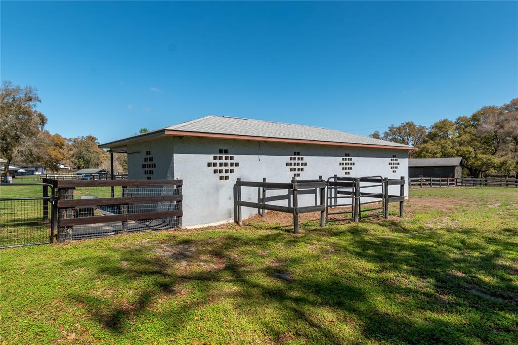 10 Carry Back Road Ocala, FL 34482 - Photo 53 of 69 a swimming pool with outdoor seating and yard