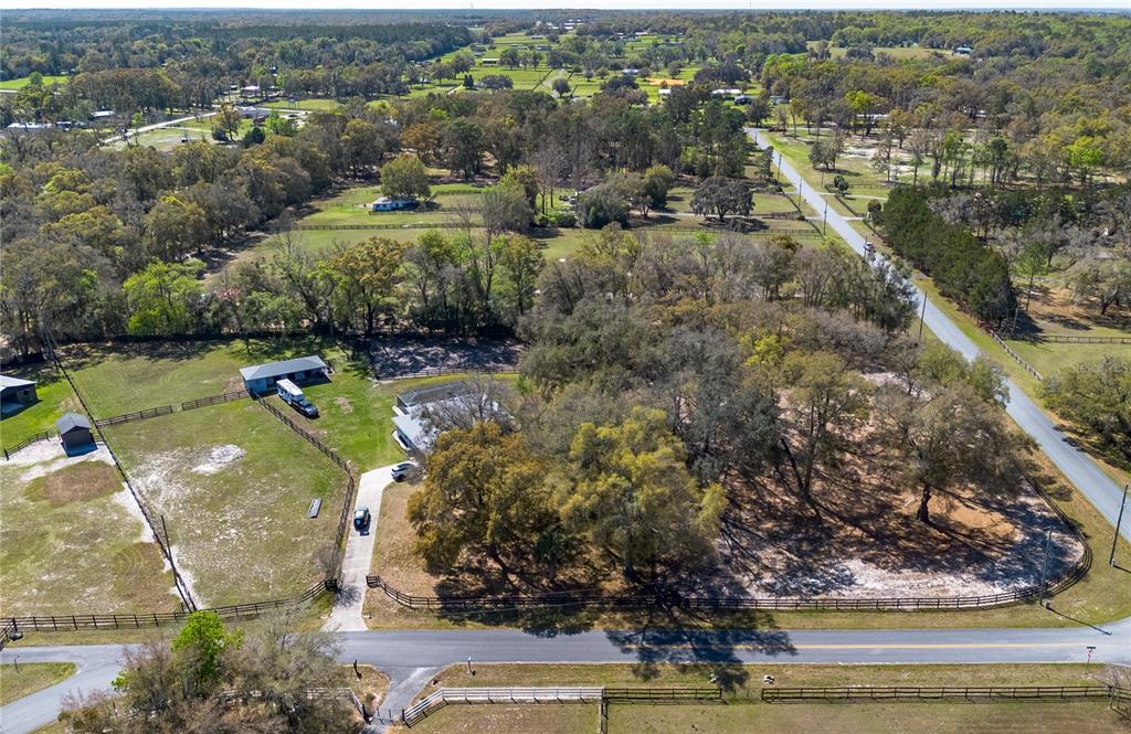 10 Carry Back Road Ocala, FL 34482 - Photo 67 of 69 an aerial view of a houses with a yard