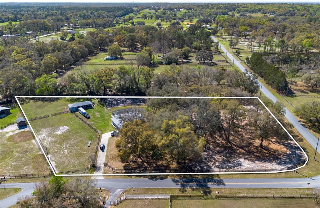 10 Carry Back Road Ocala, FL 34482 - Photo 68 of 69 an aerial view of a residential houses with outdoor space
