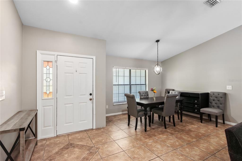 10 Carry Back Road Ocala, FL 34482 - Photo 10 of 69 a dining room with furniture and window