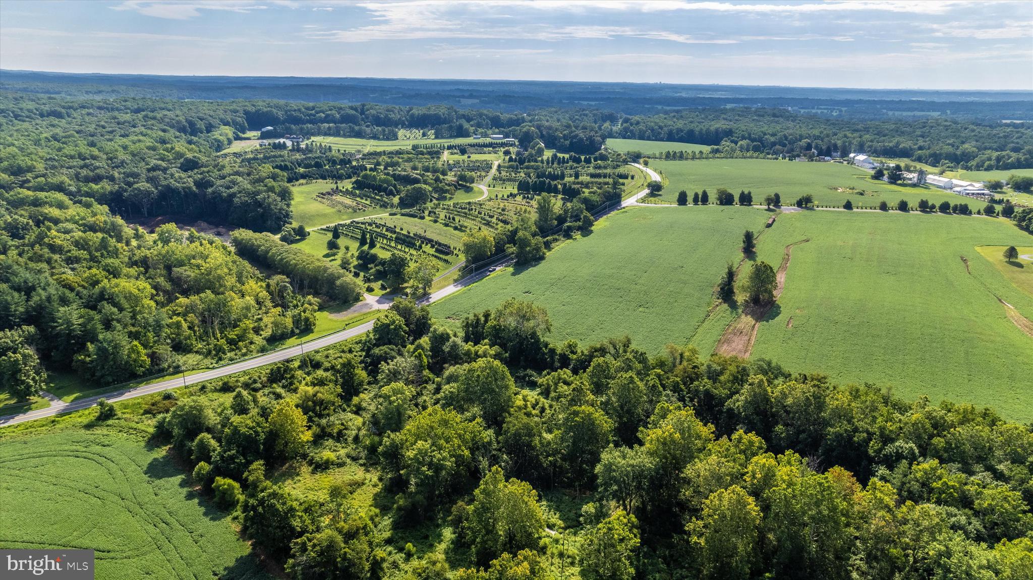 19101 Darnestown Road Poolesville, MD 20837 - Photo 8 of 29 an aerial view of a residential houses with outdoor space and trees all around