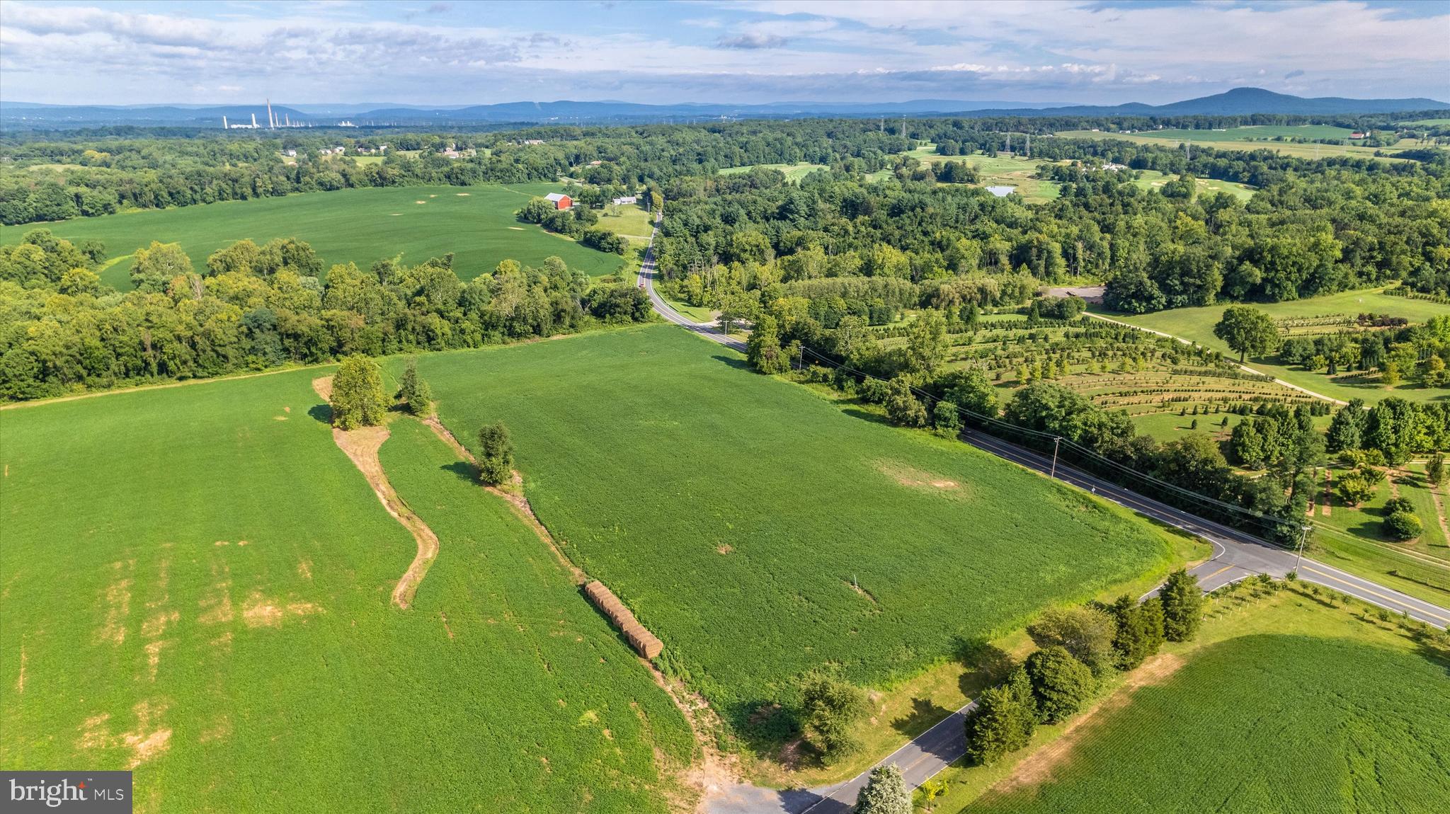 19101 Darnestown Road Poolesville, MD 20837 - Photo 9 of 29 a view of a golf course with a yard
