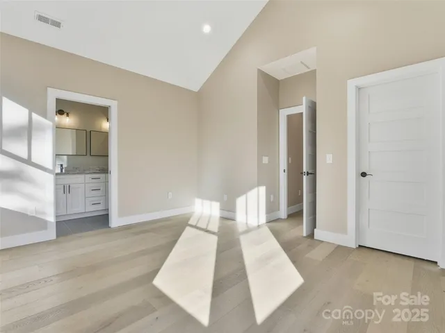 a view of an empty walk in closet