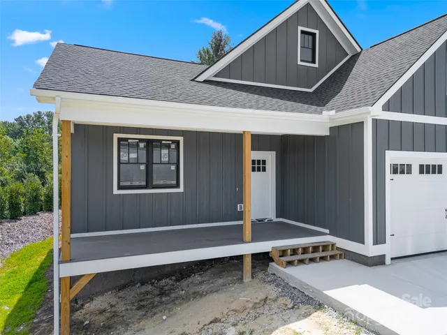 a view of a balcony with wooden floor