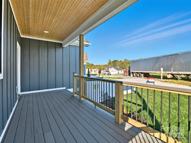 a balcony with furniture and window