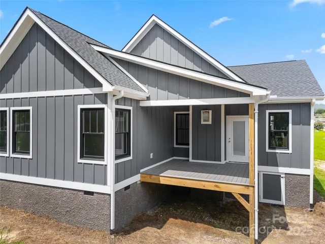 a view of balcony with wooden floor