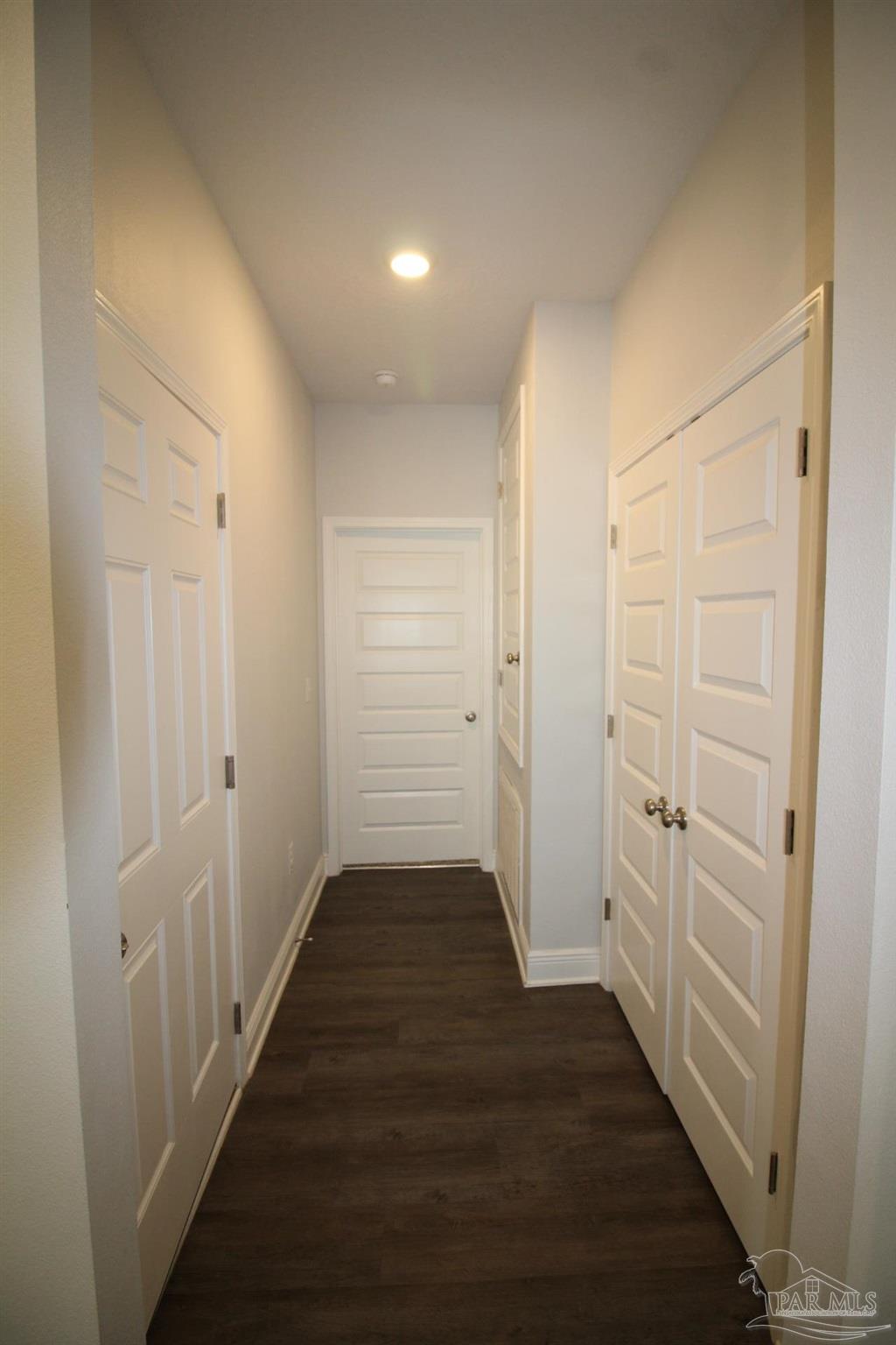 8006 Burnside Loop Pensacola, FL 32526 - Photo 16 of 22 wooden floor in an empty room