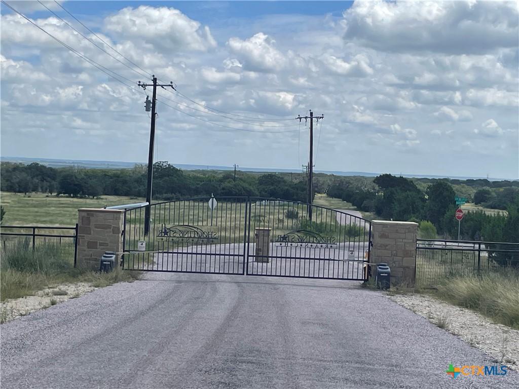 Lot 1 Shooting Star Ranch Lometa, TX 76853 - Photo 7 of 10 a view of a park with iron fence