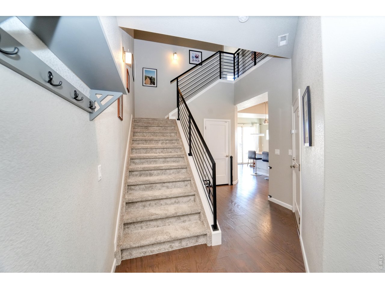 13388 Positano Point Colorado Springs, CO 80921 - Photo 2 of 26 a view of entryway and hall with wooden floor