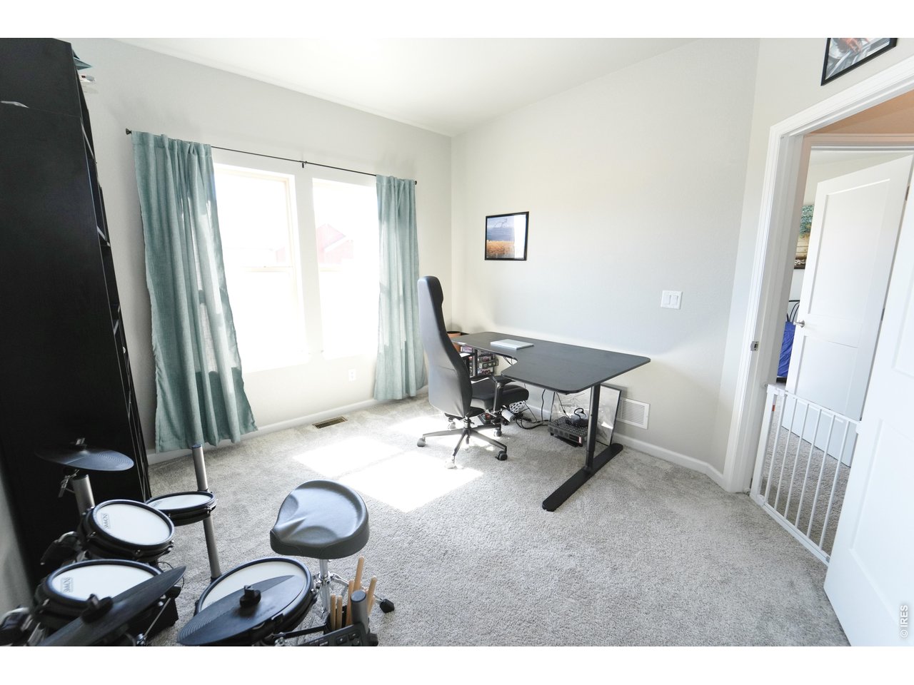 13388 Positano Point Colorado Springs, CO 80921 - Photo 22 of 26 a view of a room with gym equipment