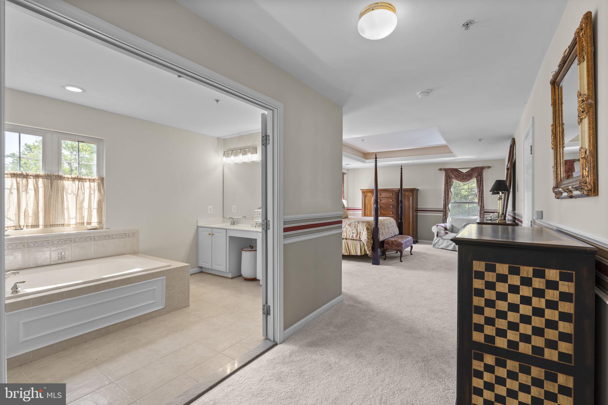 15307 Riding Path Court Laurel, MD 20707 - Photo 29 of 75 French doors lead to the full bath