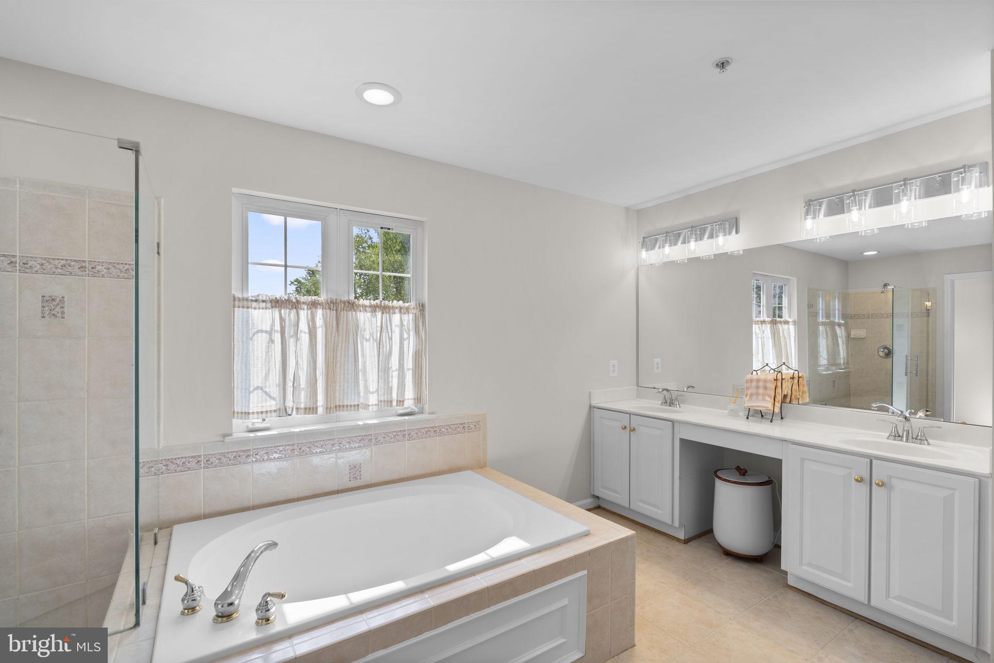 15307 Riding Path Court Laurel, MD 20707 - Photo 30 of 75 Owner's bath with double vanity