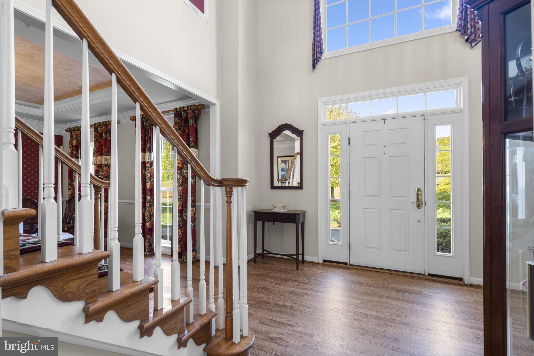 15307 Riding Path Court Laurel, MD 20707 - Photo 3 of 75 2 Story foyer with hardwood flooring