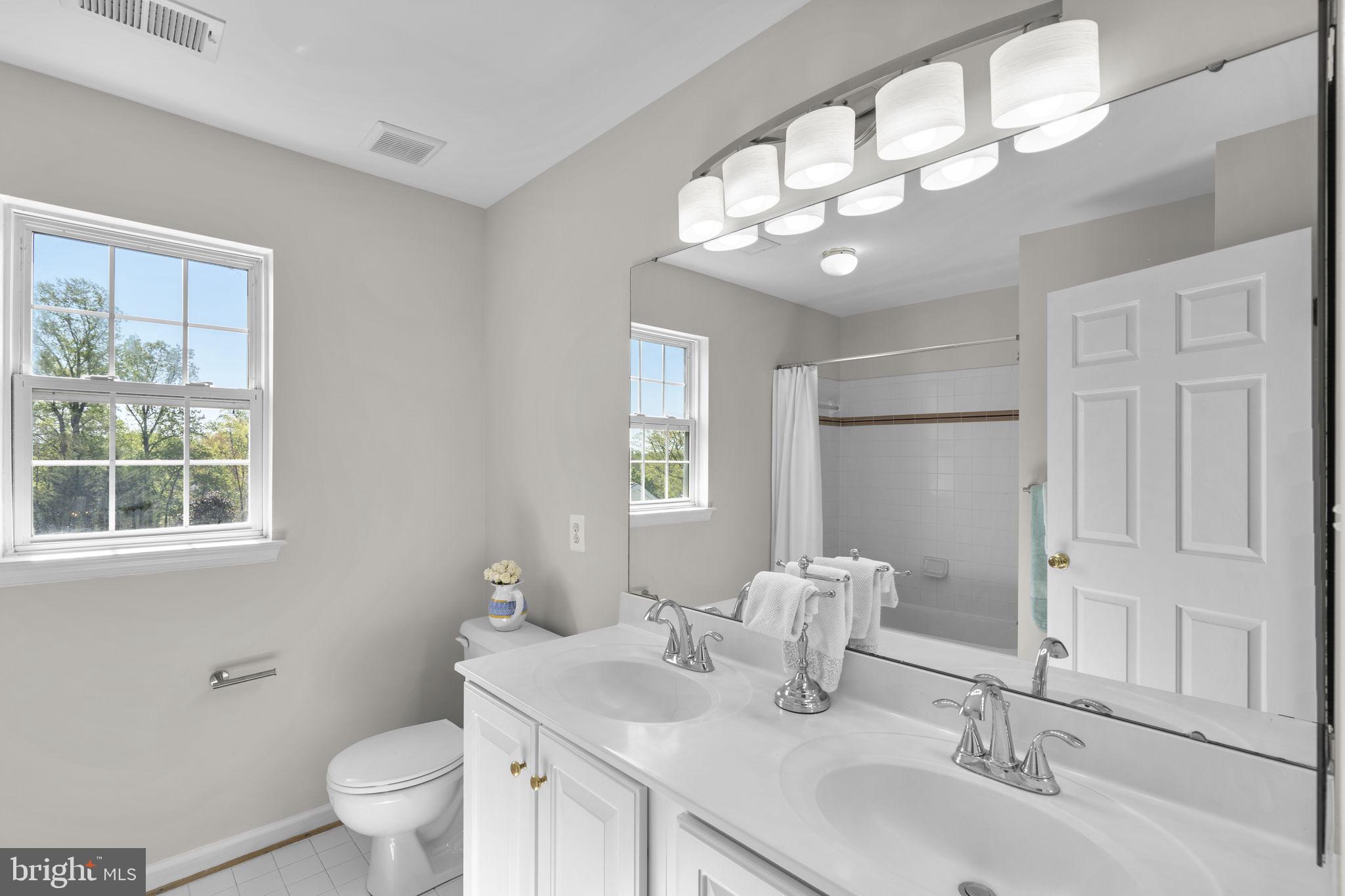 15307 Riding Path Court Laurel, MD 20707 - Photo 39 of 75 Double vanity in the full hall bath