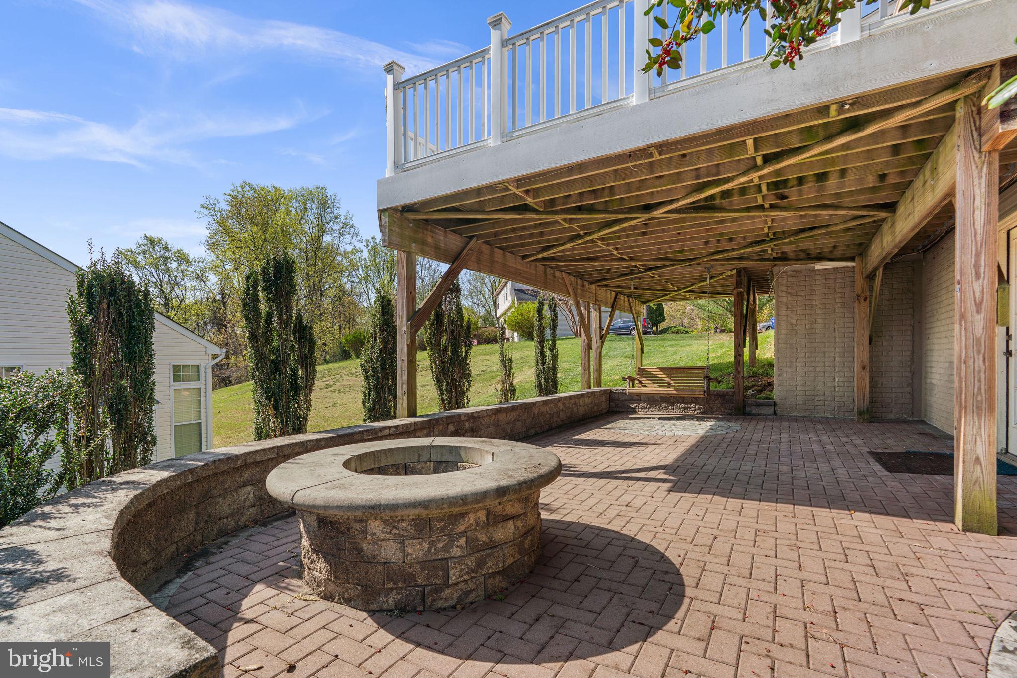 15307 Riding Path Court Laurel, MD 20707 - Photo 54 of 75 Patio fire pit & hardscaping
