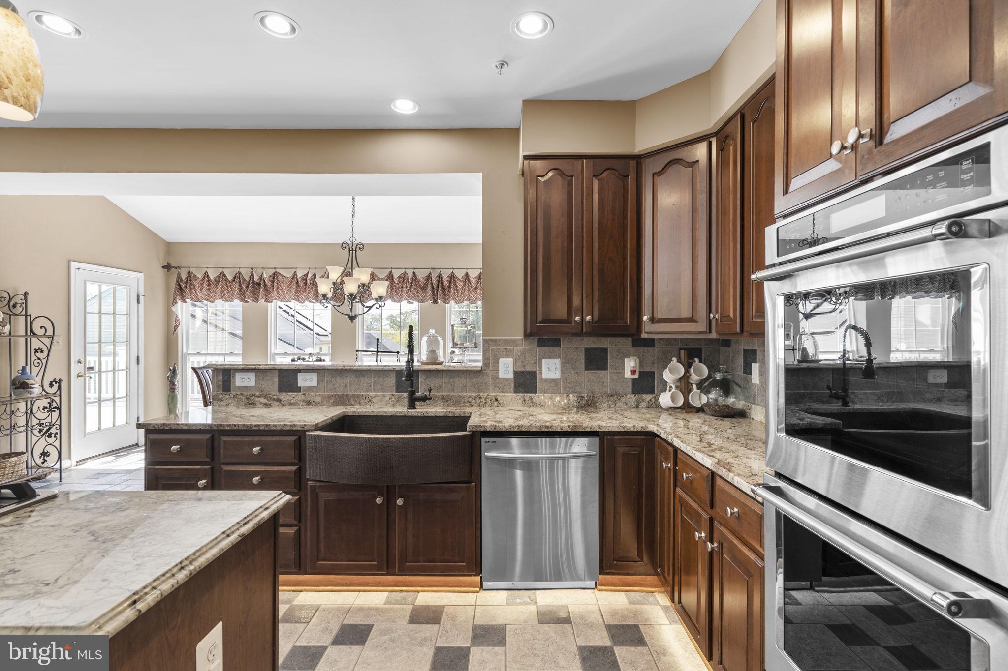 15307 Riding Path Court Laurel, MD 20707 - Photo 9 of 75 Kitchen adjoins the sunroom & breakfast area