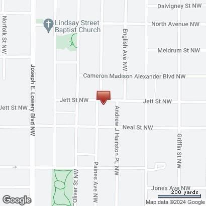 459 Paines Avenue Northwest Atlanta, GA 30318 - Photo 19 of 23 a picture of a book and a bed