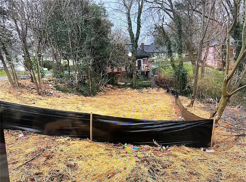 459 Paines Avenue Northwest Atlanta, GA 30318 - Photo 23 of 23 a view of a yard covered in snow