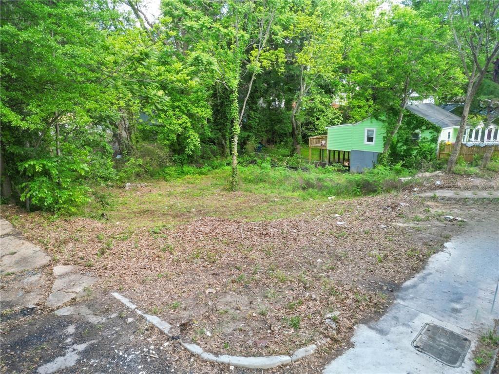 459 Paines Avenue Northwest Atlanta, GA 30318 - Photo 6 of 23 a view of a backyard with large trees