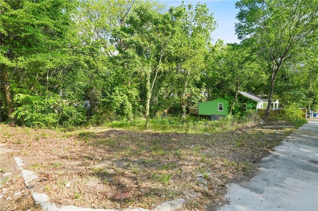 459 Paines Avenue Northwest Atlanta, GA 30318 - Photo 7 of 23 a view of a yard with plants and trees