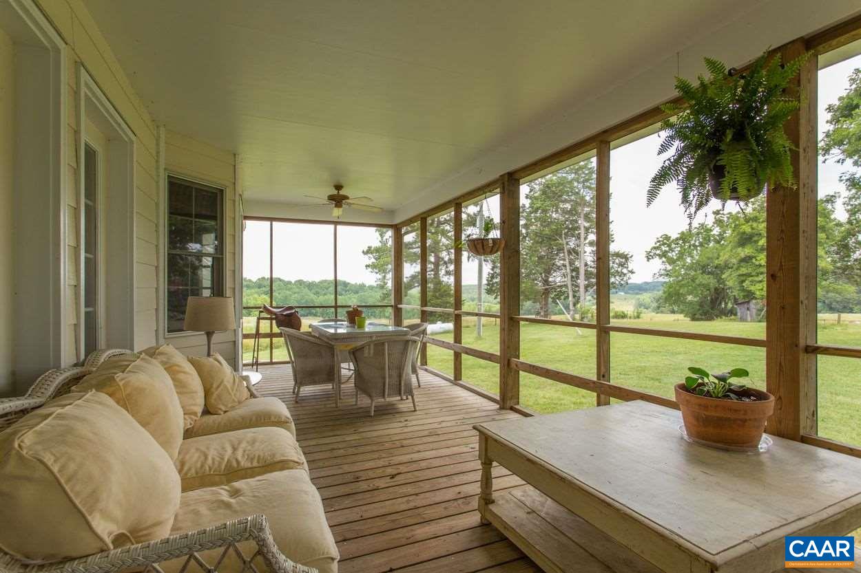 178 Heights School Road Pamplin, VA 23958 - Photo 9 of 50 a living room with furniture and floor to ceiling windows