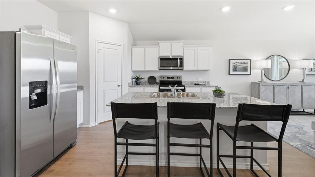 3427 Spur Run Sherman, TX 75090 - Photo 19 of 36 a dining room with furniture and a window