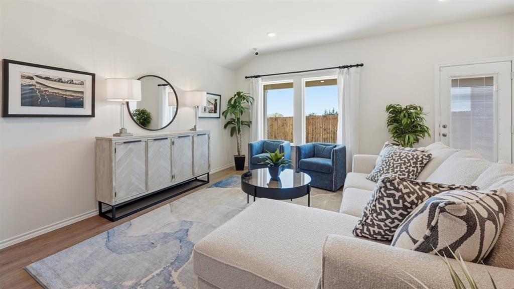 3427 Spur Run Sherman, TX 75090 - Photo 31 of 36 a living room with furniture a window and a potted plant