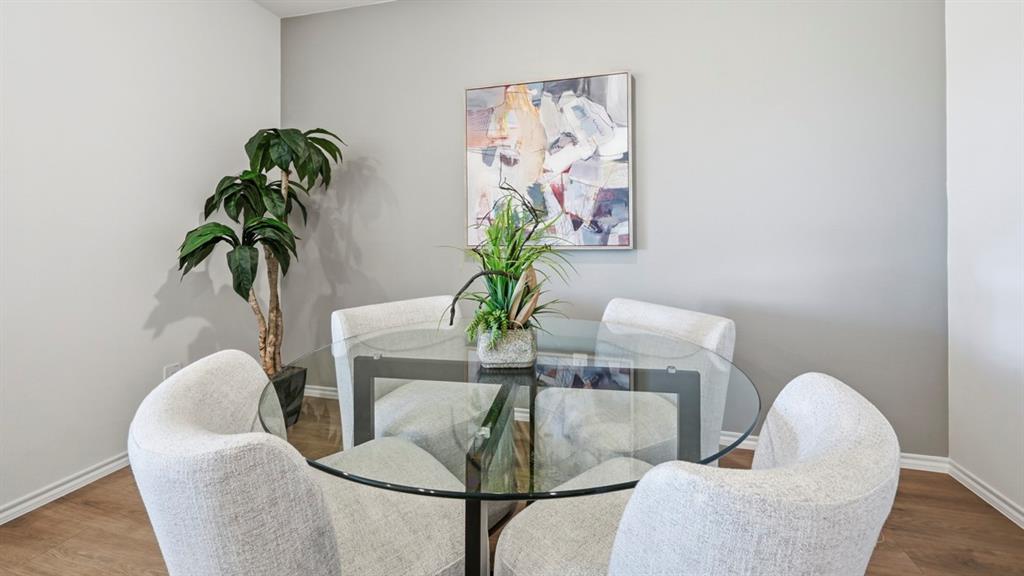 3427 Spur Run Sherman, TX 75090 - Photo 36 of 36 a dining room with furniture and a potted plant