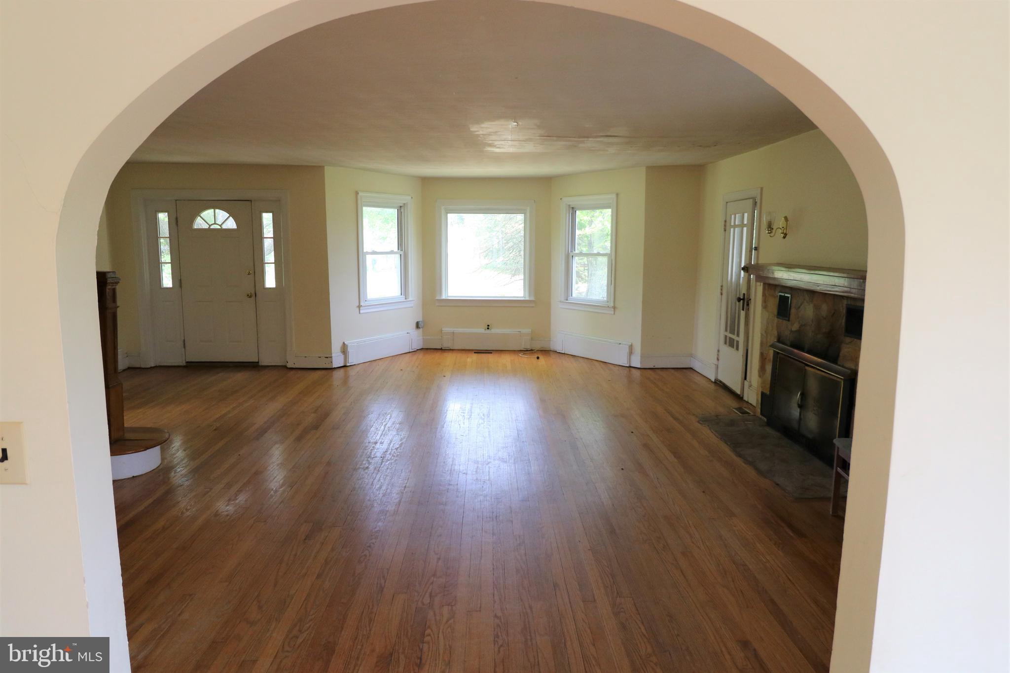 10955 H G Trueman Road Lusby, MD 20657 - Photo 28 of 53 Archway to Living Room