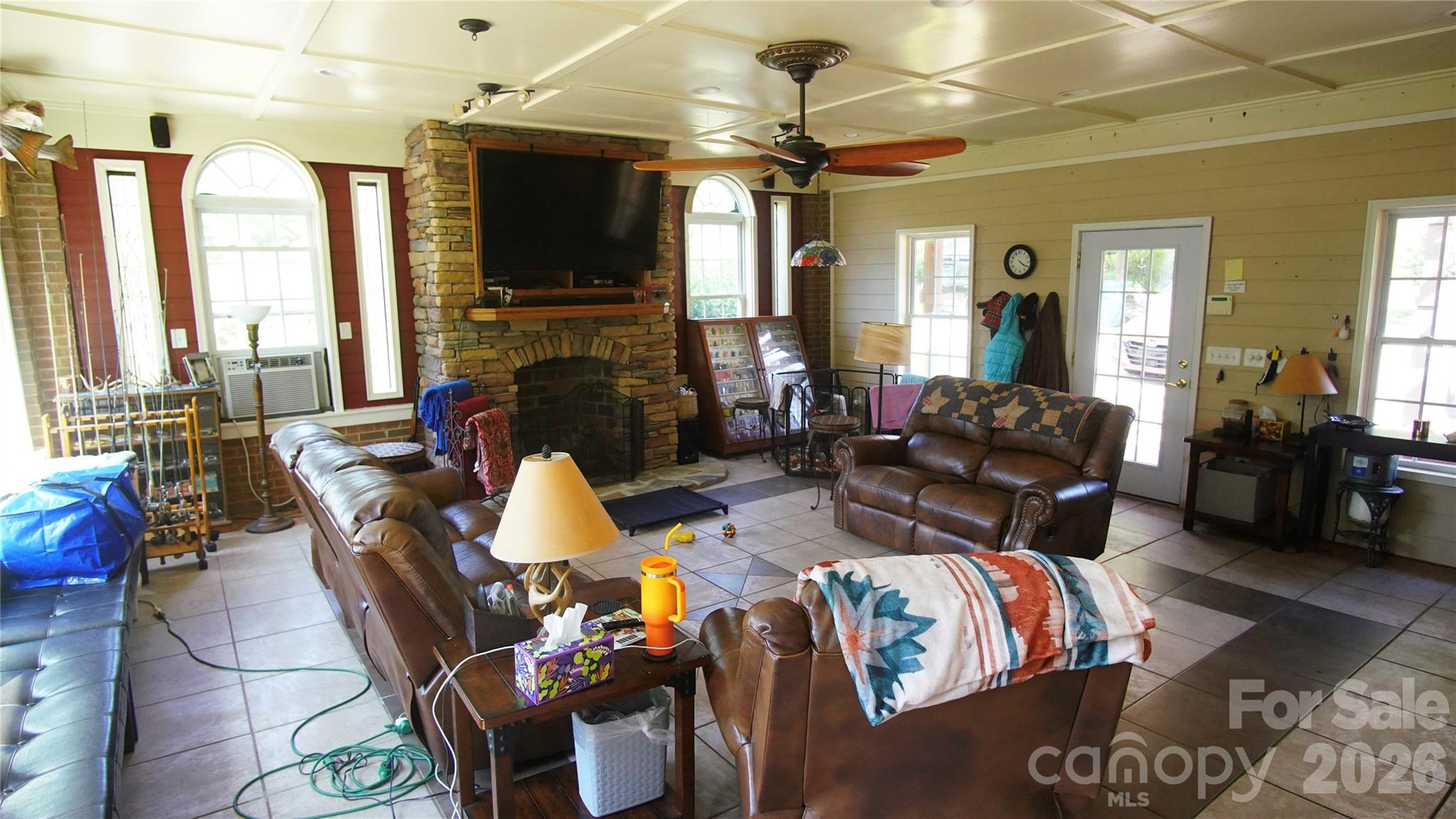 204 Old Stage Coach Road Lawndale, NC 28090 - Photo 11 of 30 a living room with fireplace furniture and a flat screen tv