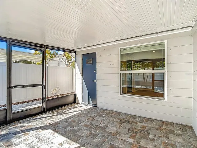 a view of a house with a large window