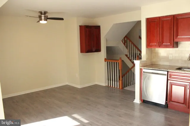 an entryway in a hall with a window