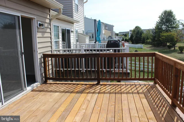 a view of balcony with a deck