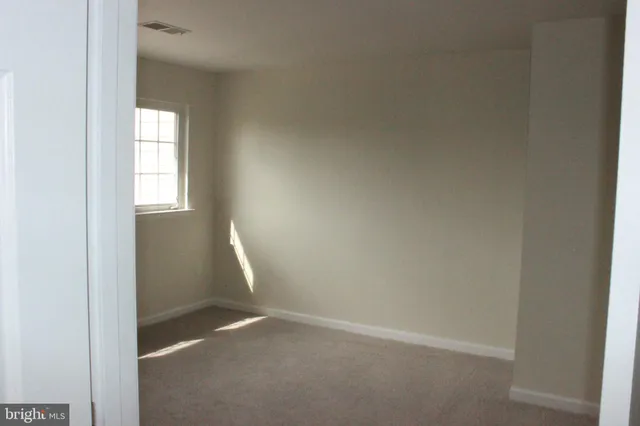 a view of empty room with window
