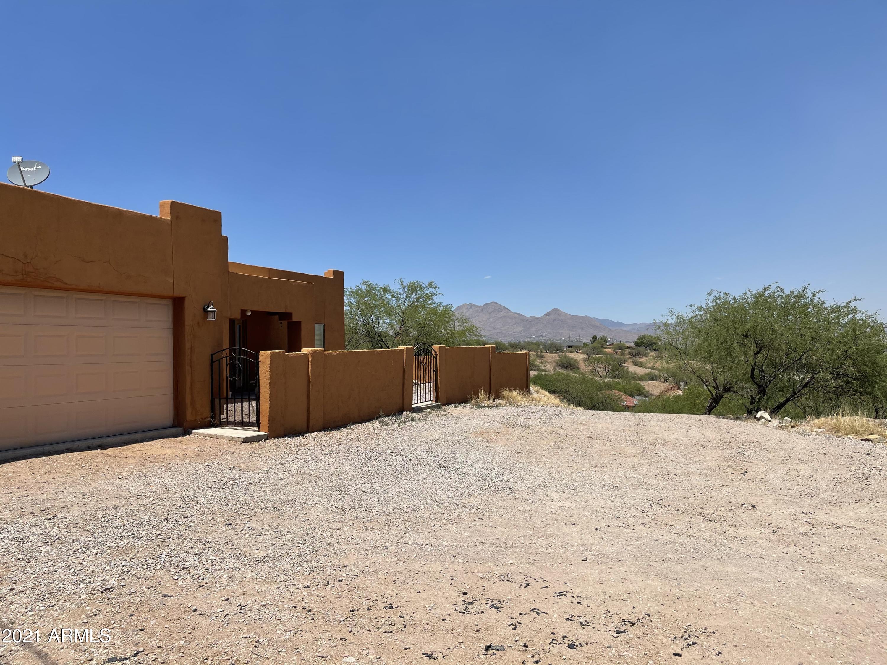 1022 Circulo Golondrina, Unit B Rio Rico, AZ 85648 - Photo 20 of 20 a view of a house with a yard