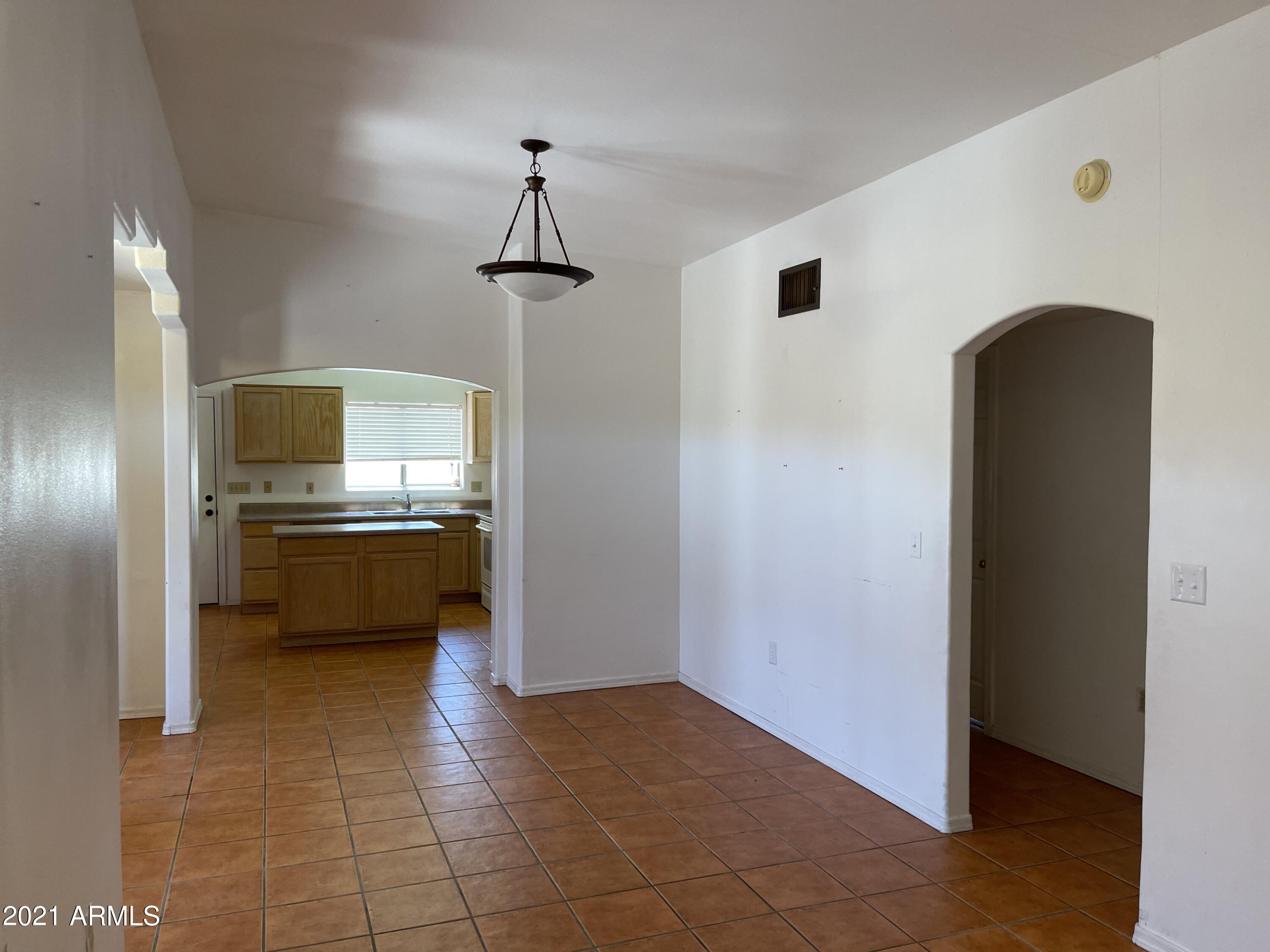 1022 Circulo Golondrina, Unit B Rio Rico, AZ 85648 - Photo 10 of 20 a view of a kitchen with a sink