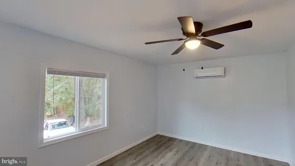 a kitchen with stainless steel appliances granite countertop a refrigerator stove and sink